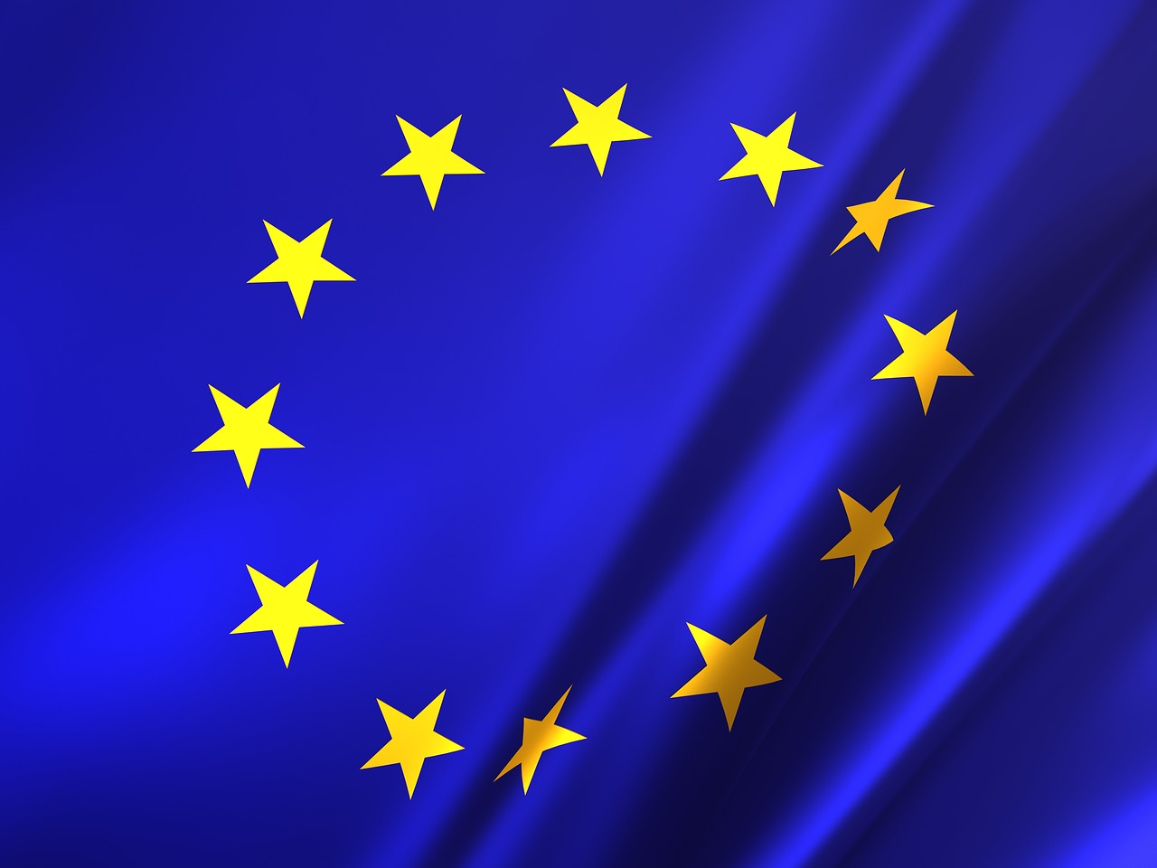 Flaga Unii Europejskie, dwanaście żółtych gwiazd na niebieskim tle